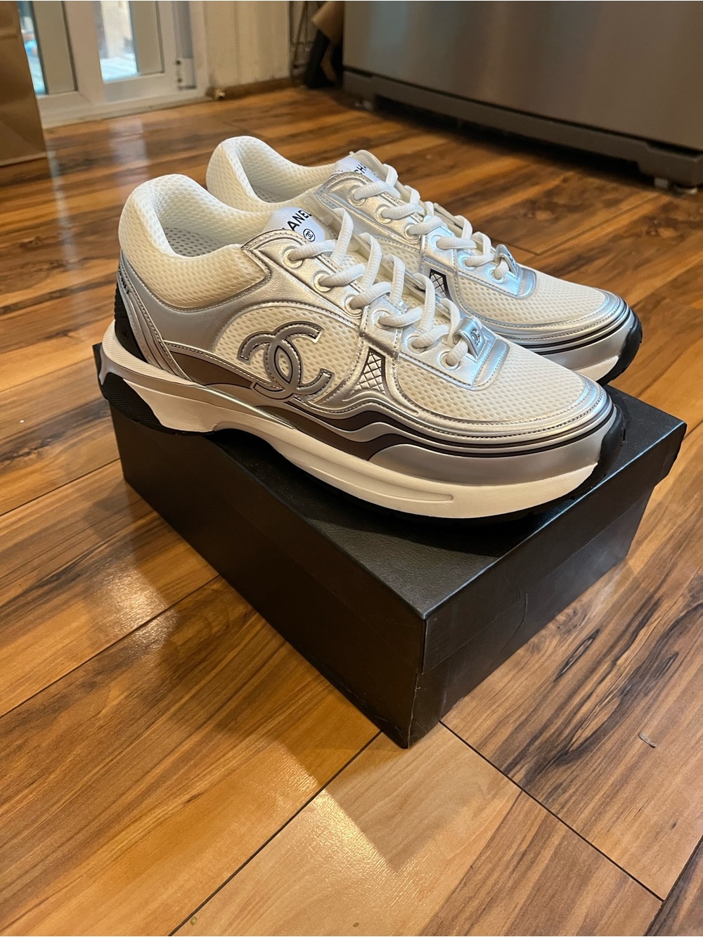CHANEL White and Silver Men's Sneakers with Logo Accent